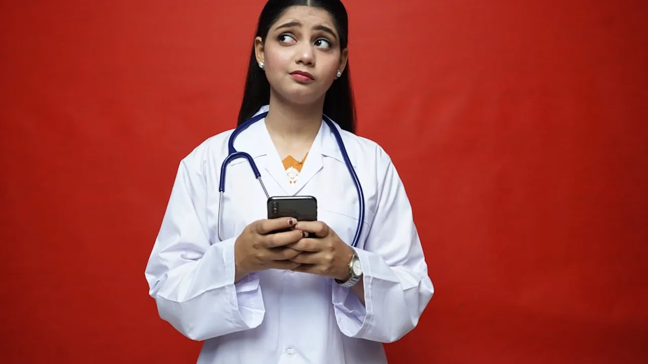a doctor holding a phone
