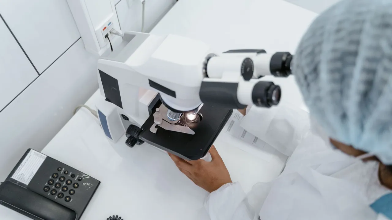 Detailed view of a microscope in a laboratory used in scientific research.
