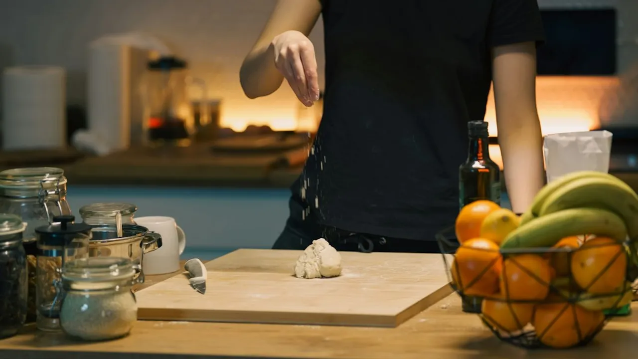 Person preparing food in a kitchen