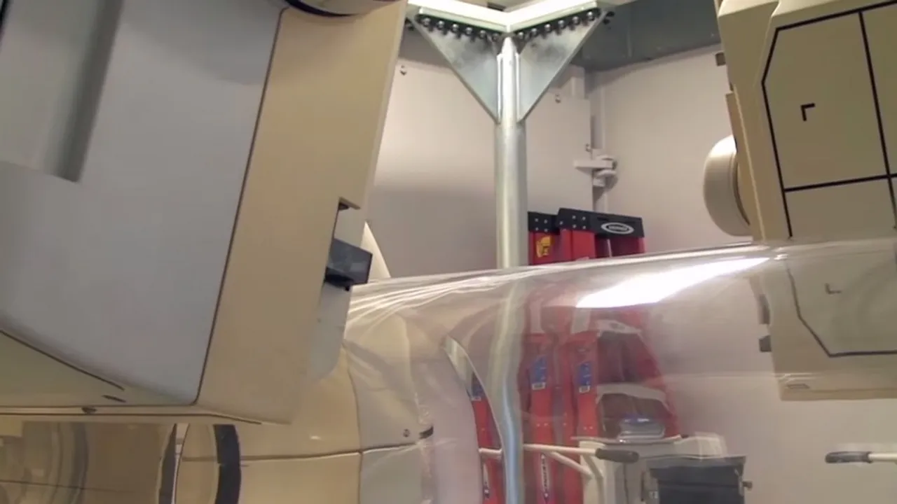 Single Photon Emission Computed Tomography (SPECT) with circular containment tube at biosafety level 4 (BSL-4) laboratory of the NIAID Integrated Research Facil