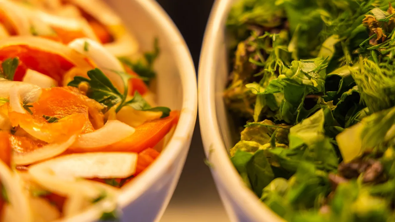 Colorful vegan salads featuring fresh vegetables in close-up for healthy eating inspiration.