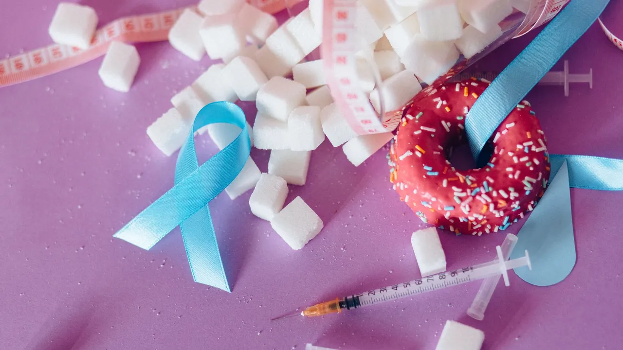 Creative composition highlighting diabetes awareness with donut, syringe, and sugar cubes on purple background.