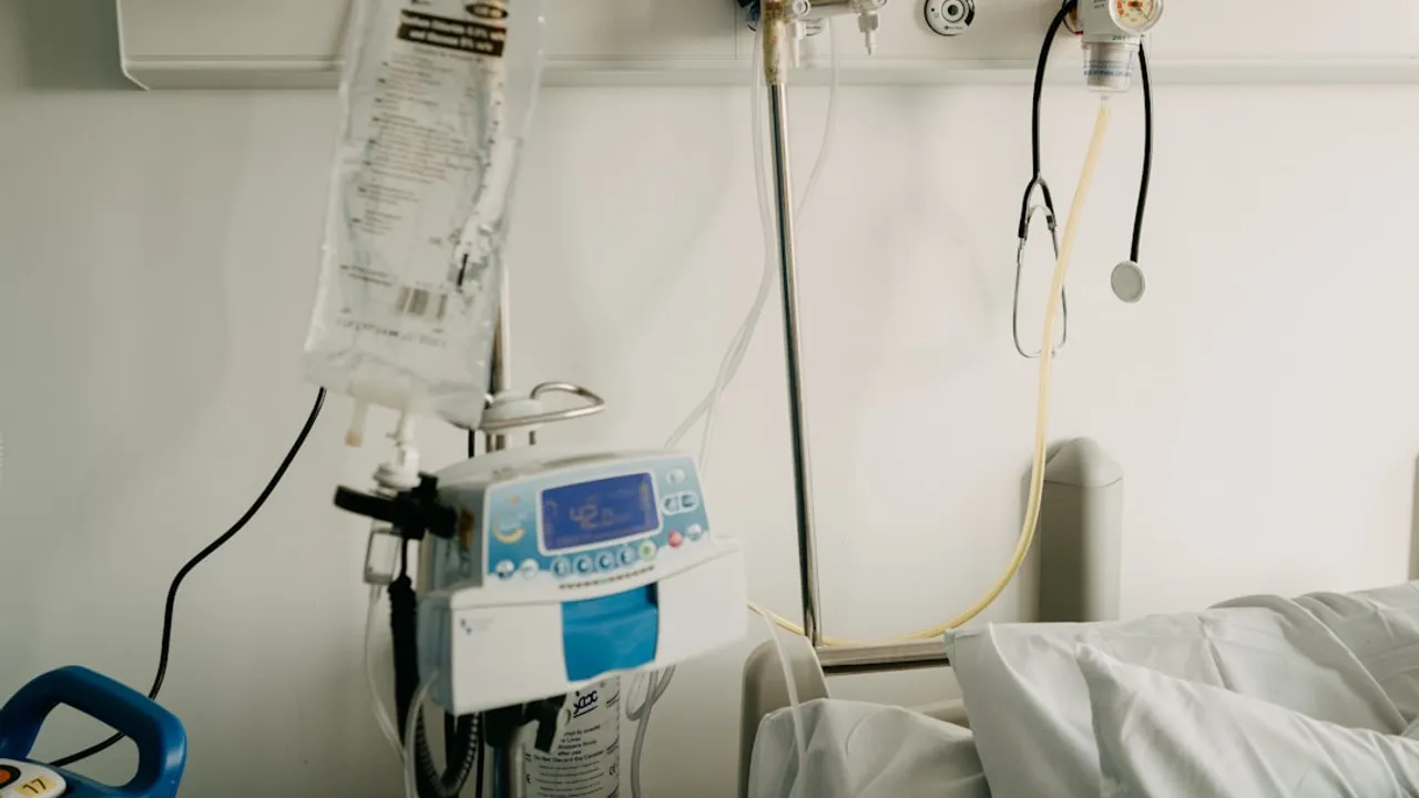 a hospital room with a bed and medical equipment